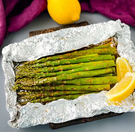 cooking asparagus on grill in foil